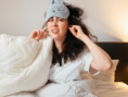 woman woken up from noisy neighbors