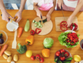 hands chopping and cutting vegetables