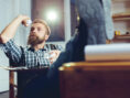 Businessman wastefully throws away paper.