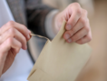 person opening mail